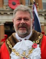 Ipswich Mayor Councillor John Cook wearing a remembrance poppy