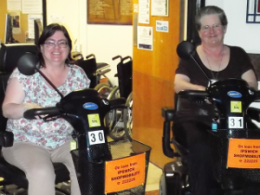 Shopmobility volunteers on scooters