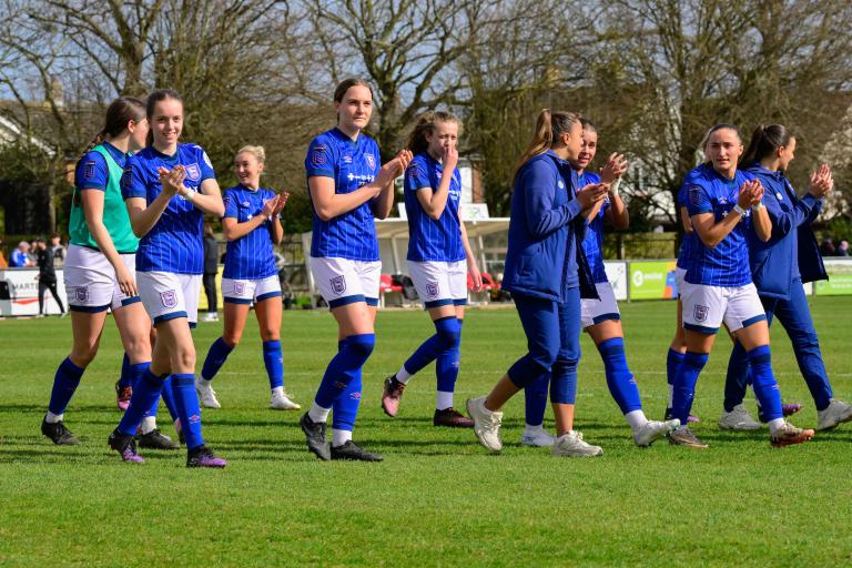 Players from the Ipswich Town Women team as they applaud fans