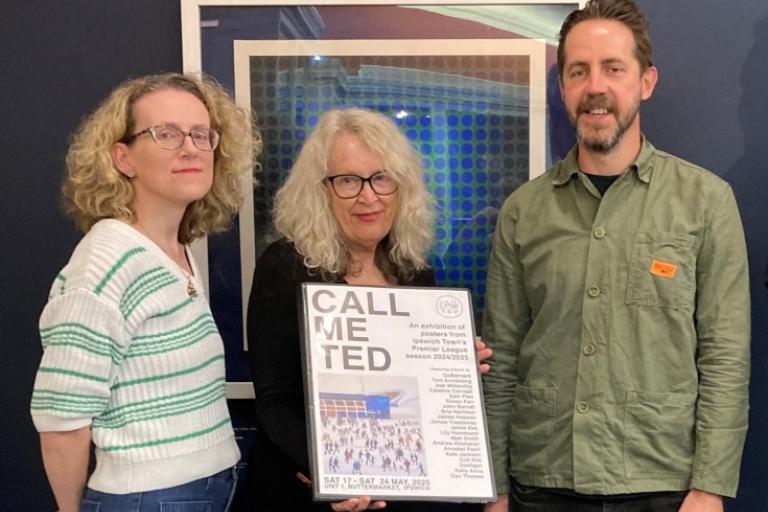 Group of three people with a portfolio of prints donated to Ipswich Museums