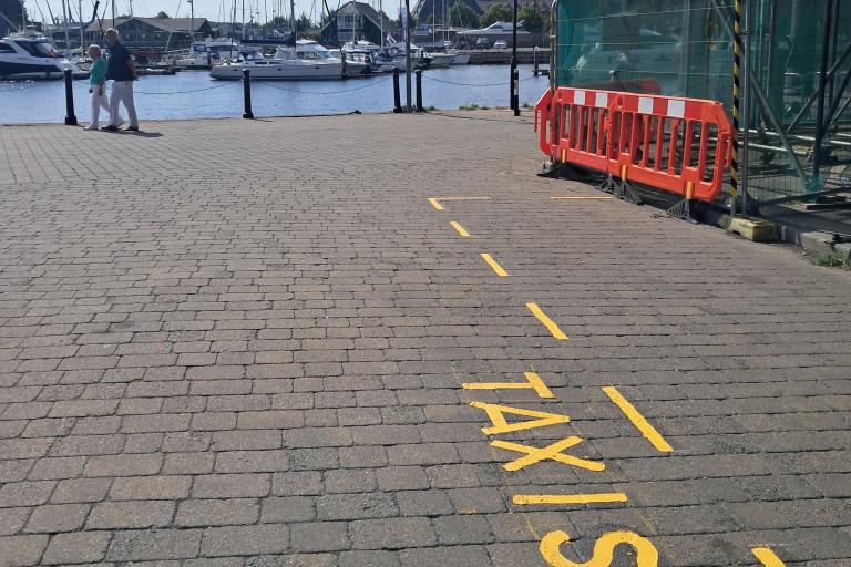 View of Key Street at Ipswich Waterfront with road marking for Taxis