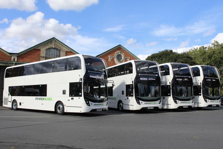 Four double deck buses