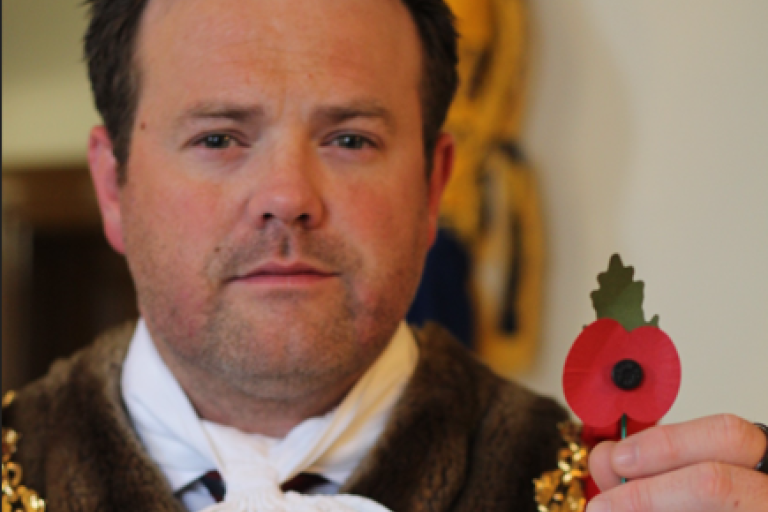 Mayor with poppy _For Remembrance 2025