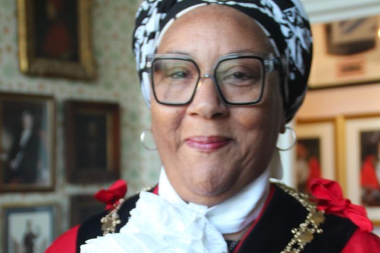 Deputy Mayor of Ipswich wearing her robes and chain of office