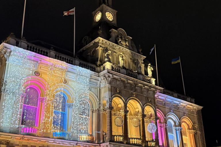 Ipswich Town Hall at night with festive decorations