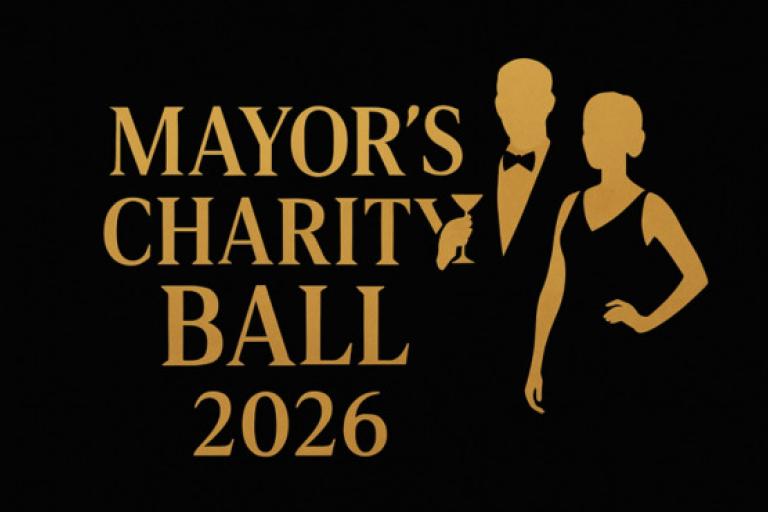 gold coloured letters and couple outline shapes on black background