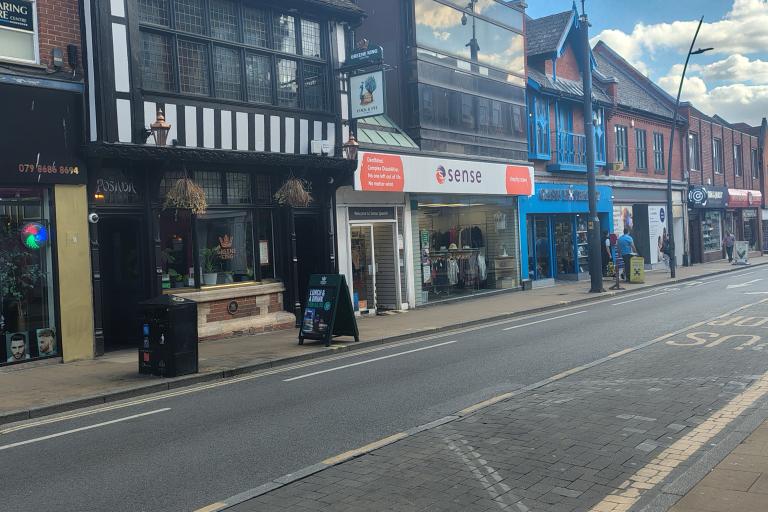 Clean street in Ipswich no rubbish outside shop fronts