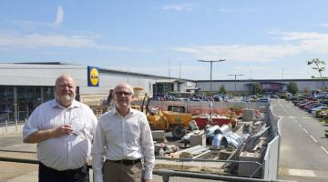 Cllr Neil MacDonald and Cllr Colin Kreidewolf outside the new Lidl at Anglia Retail Park in Ipswich