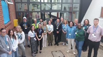 A group of staff and volunteers with the Mayor of Ipswich outside the Inspire building