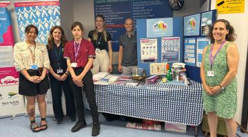 Group of people staffing an information stand at Ipswich Hospital