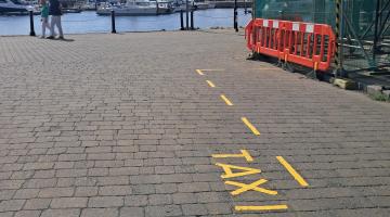 View of Key Street at Ipswich Waterfront with road marking for Taxis